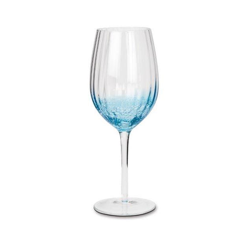 Red wine glass with blue bubbles