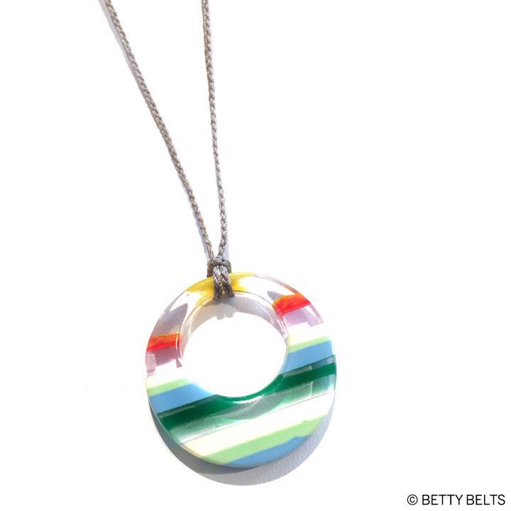 Upcycled surfboard resin cresent hoop on a cord necklace