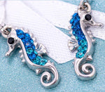 Seahorse dangle earrings